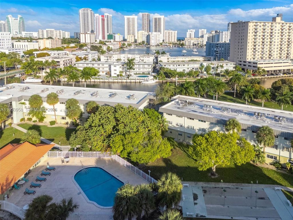 Photo of 300 Layne Blvd #212, Hallandale Beach, FL 33009 (MLS # A11953958)