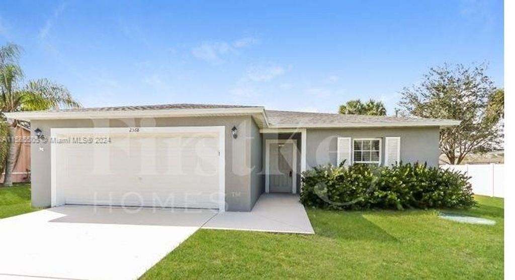 Photo of 2568 SW Deckard St, Port Saint Lucie, FL 34953 (MLS # A11585505)