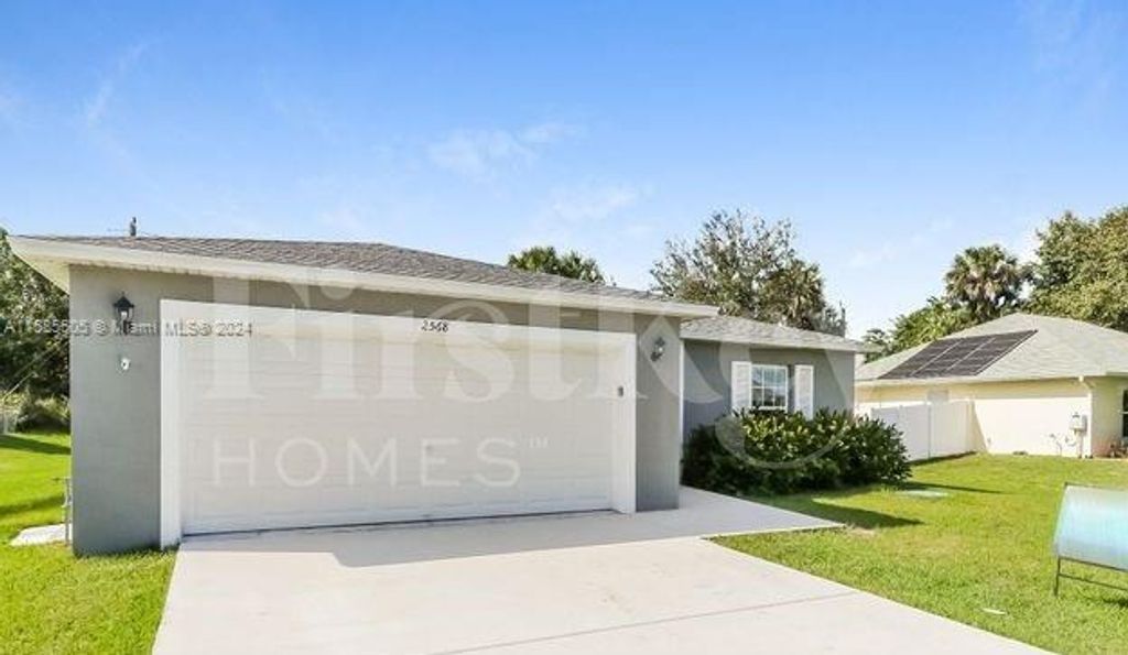 Photo of 2568 SW Deckard St, Port Saint Lucie, FL 34953 (MLS # A11585505)