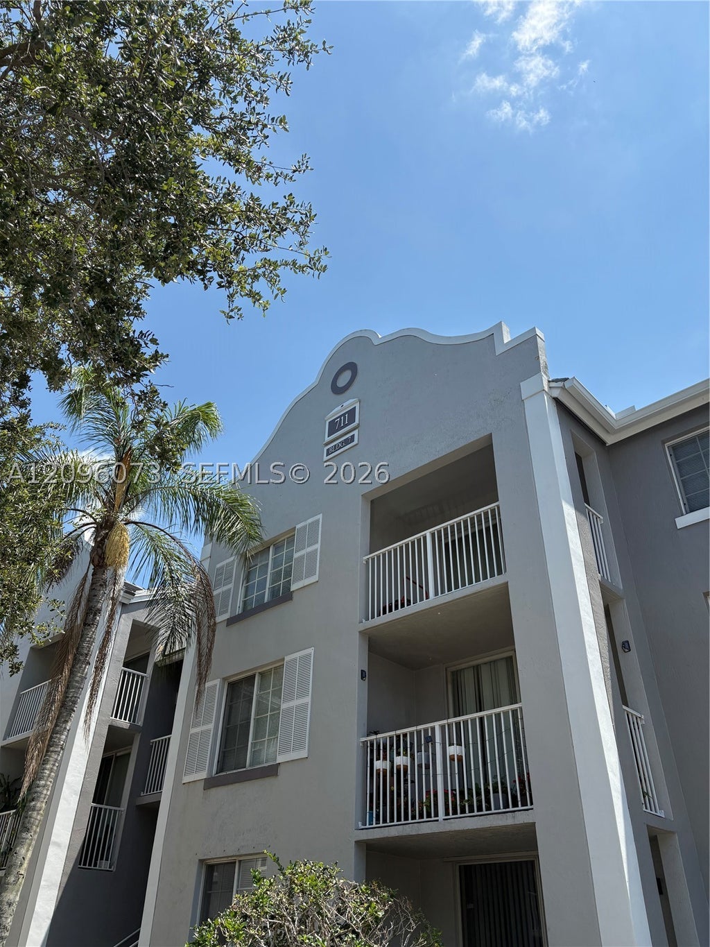 Photo of 711 SW 111th Way #202, Pembroke Pines, FL 33025 (MLS # A12096073)