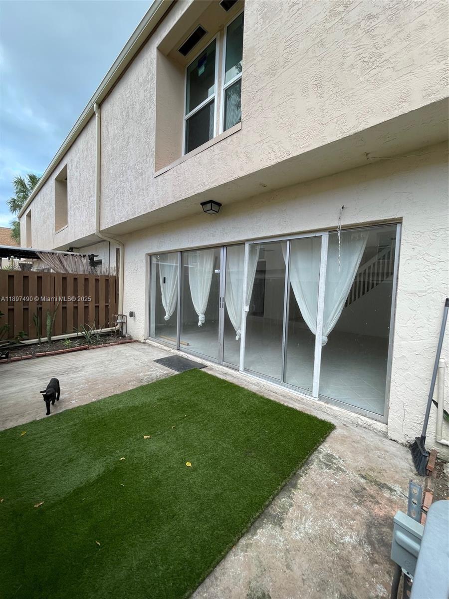 TOWNHOUSES AT JACARANDA - Residential