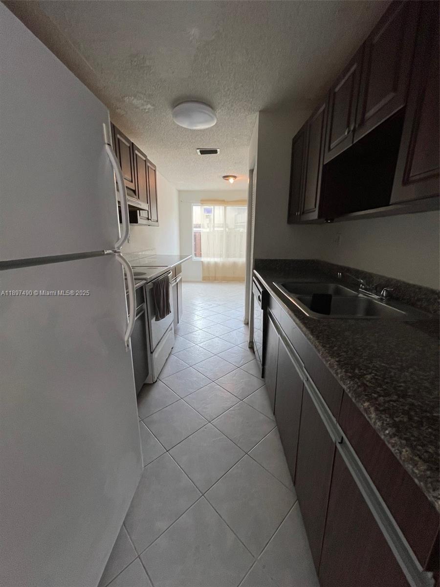 TOWNHOUSES AT JACARANDA - Residential