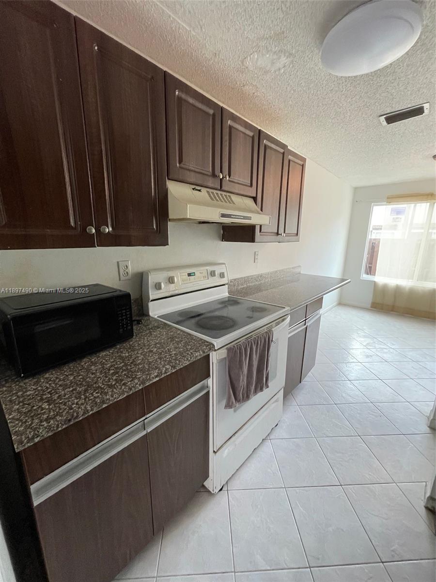 TOWNHOUSES AT JACARANDA - Residential