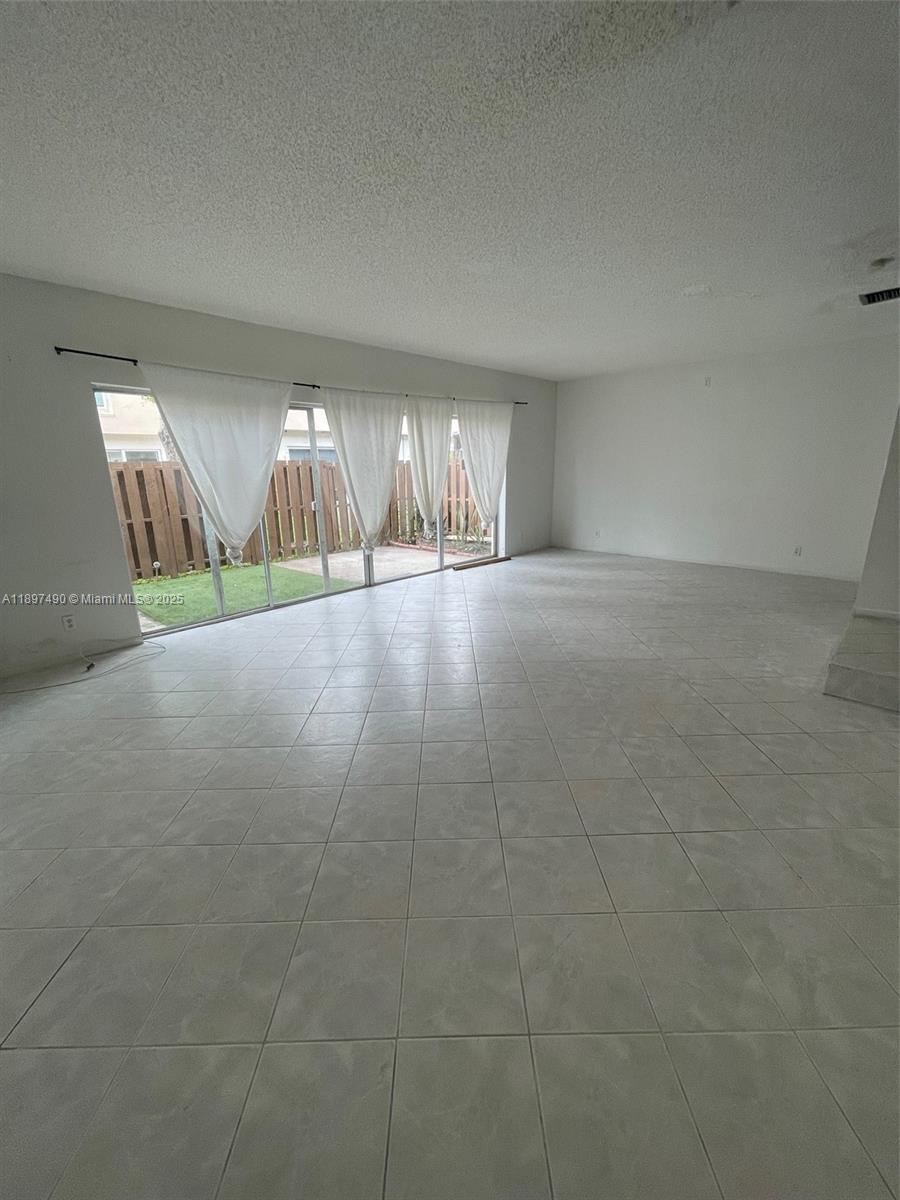 TOWNHOUSES AT JACARANDA - Residential