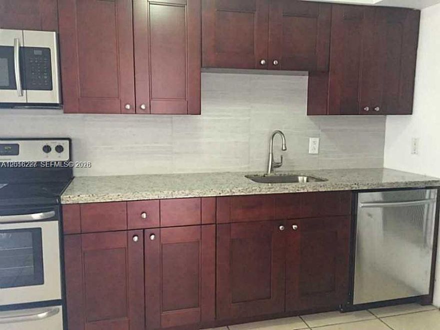 2 bedroom, 2 bath condo located on desirable Sans Souci Blvd., close to shopping centers, restaurants, and entertainment, and just a 10-minute drive to the beach. Features impact windows installed in 2024, brand-new appliances, and a recently remodeled kitchen. Located in a great school district, making it a perfect choice for your future home or an excellent investment opportunity. Can be leased immediately with no rental restrictions. LOW HOA. NO SPECIAL ASSESSMENT. The condominium is in strong financial condition. A fantastic opportunity—priced to sell!