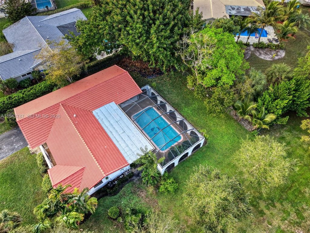 Photo of 10251 NW 39th Ct, Coral Springs, FL 33065 (MLS # A11943787)