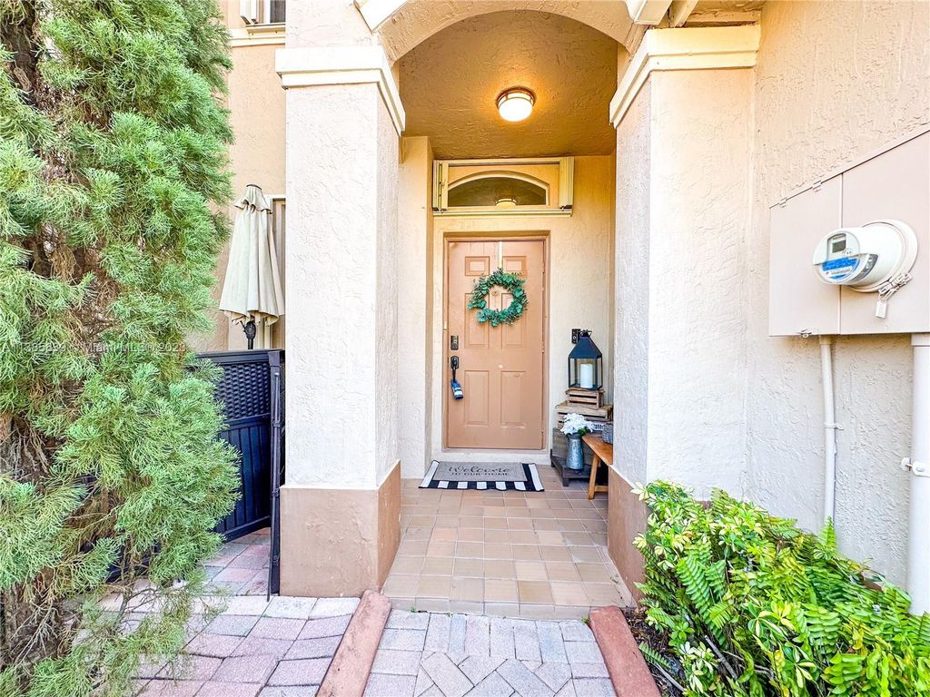 Photo of 130 Riverwalk Cir #130, Sunrise, FL 33326 (MLS # A11385839)