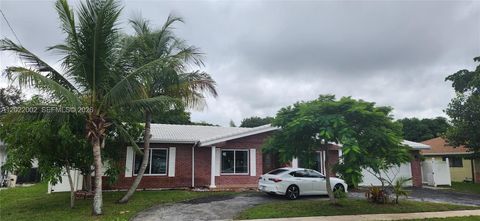 Photo of 5260 SW 9th St, Plantation, FL 33317 (MLS # A12022002)