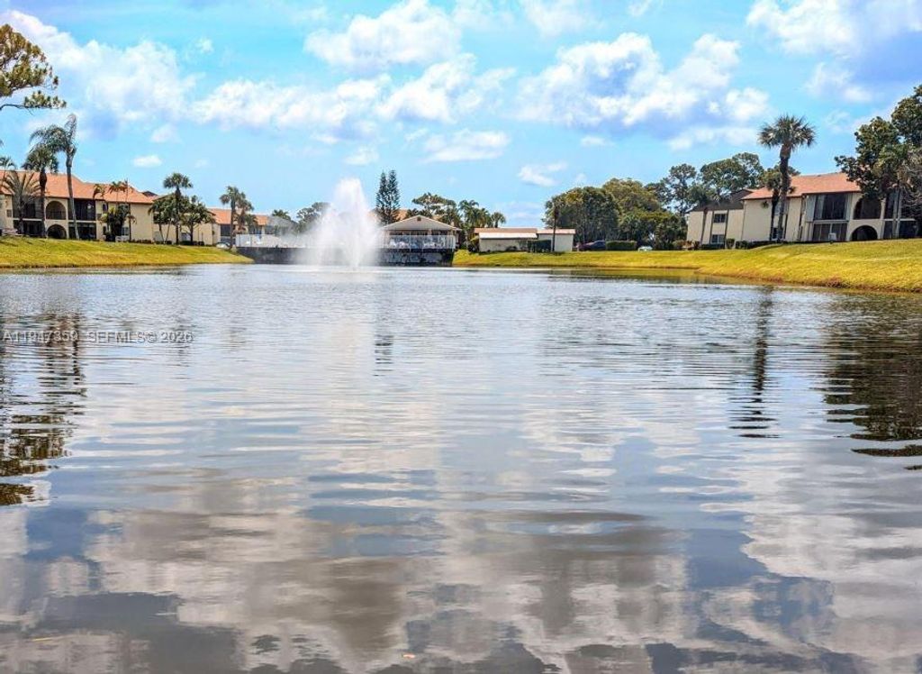 Photo of 5801 Whispering Pine Way #A1, Palm Beach, FL 33463 (MLS # A11947359)