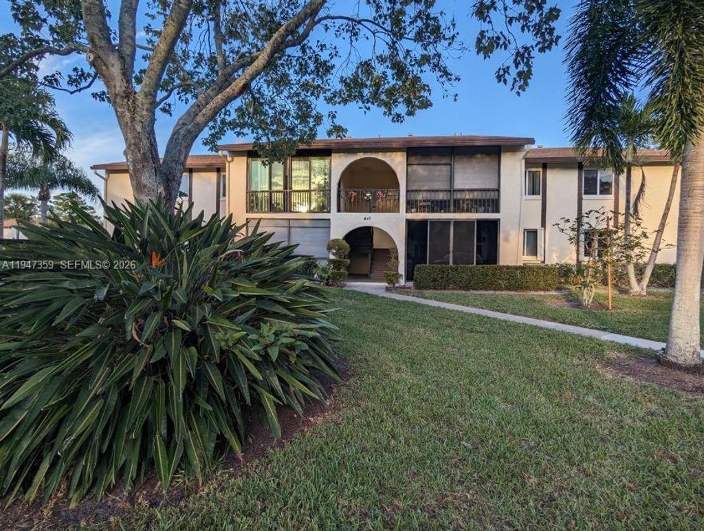 Photo of 5801 Whispering Pine Way #A1, Palm Beach, FL 33463 (MLS # A11947359)