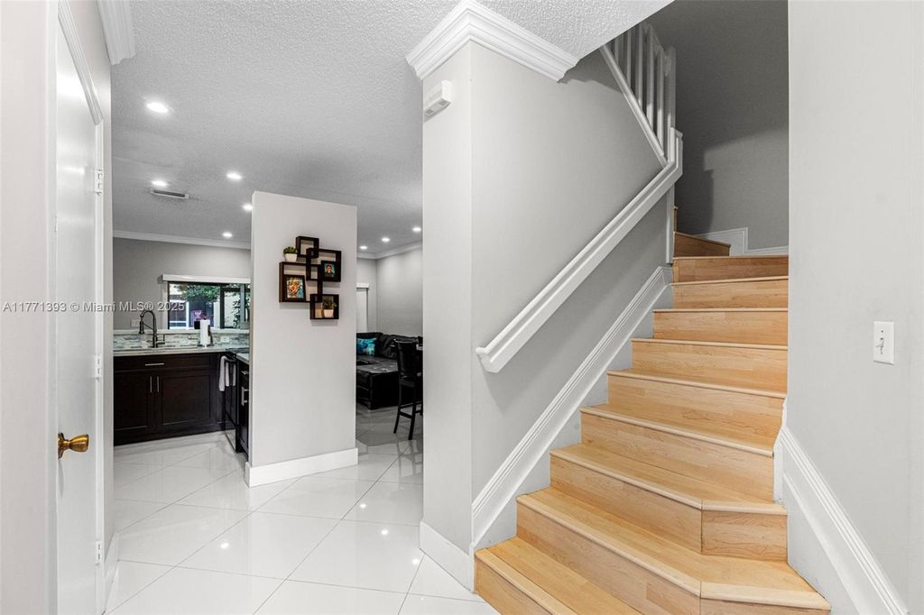 Photo of 12110 SW 2nd St, Pembroke Pines, FL 33025 (MLS # A11771393)