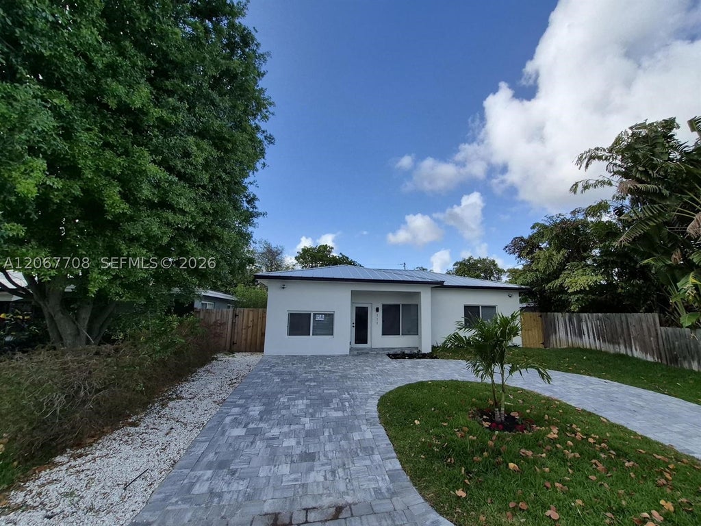 Photo of 111 NE 45th St, Oakland Park, FL 33334 (MLS # A12067708)