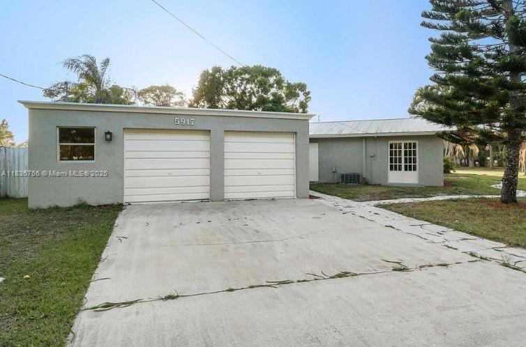 Discover this stunning oversized corner home in the sought-after Lakewood Park, featuring three bedrooms, two and a half bathrooms, and a den that can easily serve as a fourth bedroom. The property boasts a metal roof, a large courtyard entrance, tile flooring, and updated bathrooms, complemented by a well-maintained kitchen equipped with wooden cabinets. New pool pump, new fence and septic tank only 2 years old. Two AC units. The inviting backyard is perfect for entertaining, offering tranquil views of the pool and lake. This exceptional home is a must-see and is available at an incredible price, waiting for you to make it your own.