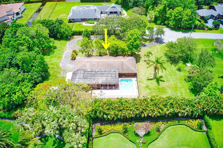 LOCATION, LOCATION, LOCATION! Rare fixer-upper in coveted Plantation Acres, quietly situated on a cul-de-sac with nearly 1 acre of land. Now priced at $899,999, below market for a fast CASH ONLY sale! Appraised at $993K, this 4BR/3BA home offers huge upside potential—perfect for investors or flippers looking to renovate or rebuild a custom estate among multimillion-dollar properties. Sold as-is, no repairs or concessions. Major updates needed: roof, cast iron plumbing, HVAC ducts, and electrical panel. Uninsurable/financeable—cash buyers with POF only. See attachment for details.