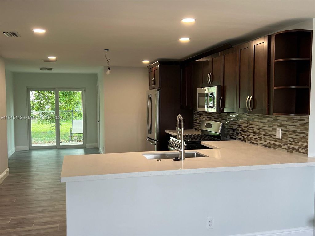 Photo of 4799 Saratoga Rd, West Palm Beach, FL 33415 (MLS # A11615143)