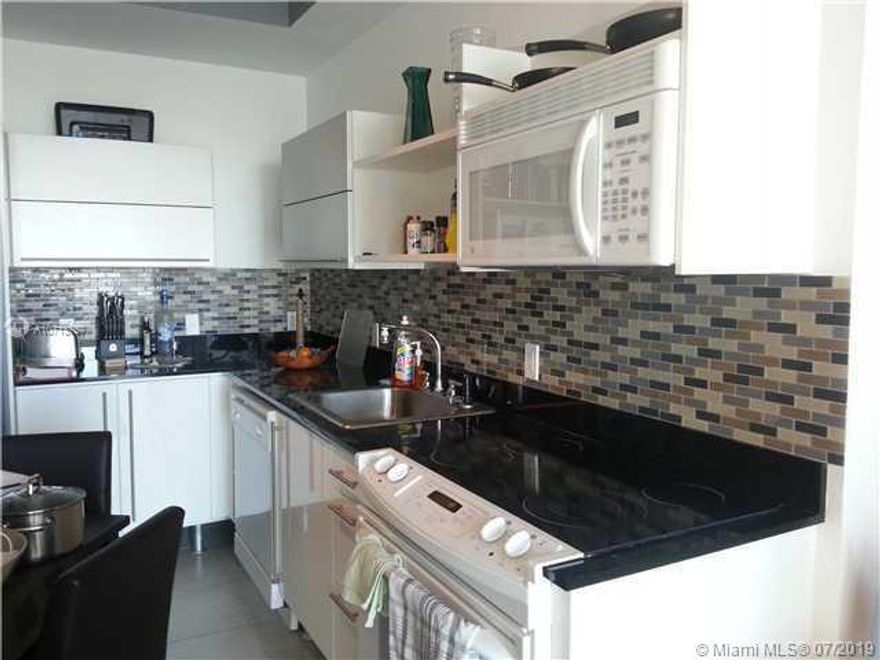 Bright and updated studio in the heart of Brickell. Freshly painted. Located right on the Miami River, with all the shops, City Center, restaurants, and entertainment located within walking distance. The studio features ceramic tile throughout, high ceiling, updated kitchen and bathroom. Modern building with a great view overlooking the pool and the scenic Miami Downtown Skyline. Washer and dryer inside the unit. Neo Vertika building features many amenities including swimming pool, jacuzzi, spa, steam room, fitness center, game room and full time security.