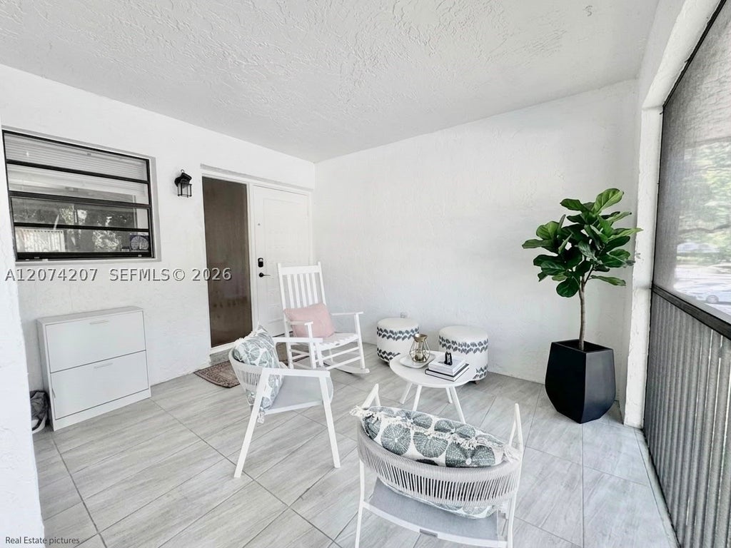 Photo of 3432 NW 86th Way #201, Sunrise, FL 33351 (MLS # A12074207)