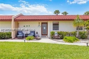 Photo of 302 Lake Evelyn Dr #302, West Palm Beach, FL 33411 (MLS # A12072187)