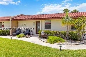 Photo of 302 Lake Evelyn Dr #302, West Palm Beach, FL 33411 (MLS # A12072187)
