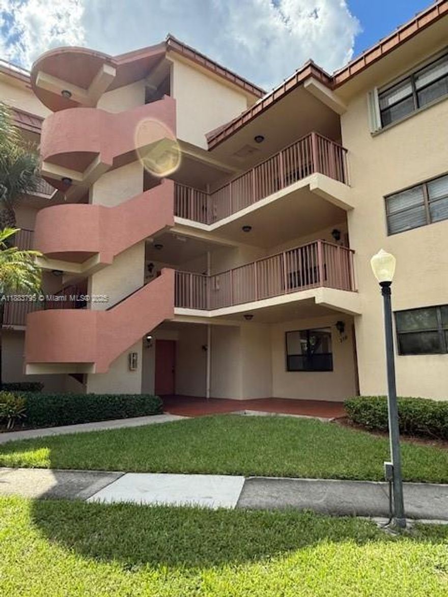 Spacious First-Floor Apartment with Recent Upgrades!
Move right into this freshly painted first-floor unit featuring a new refrigerator and upgraded bathrooms. Enjoy bright, open concept living and dining areas with new tile floors throughout the living room, dining room, and bedroom, plus generous closet space. Relax on your screened balcony. The in-unit washer and dryer add extra convenience, and water is included in the rent. 
This gated community is well maintained and offers a sparkling pool and plenty of guest parking. Ideally located just minutes from Westfield Broward Mall, major highways, shopping, dining, and more. Don’t miss out!