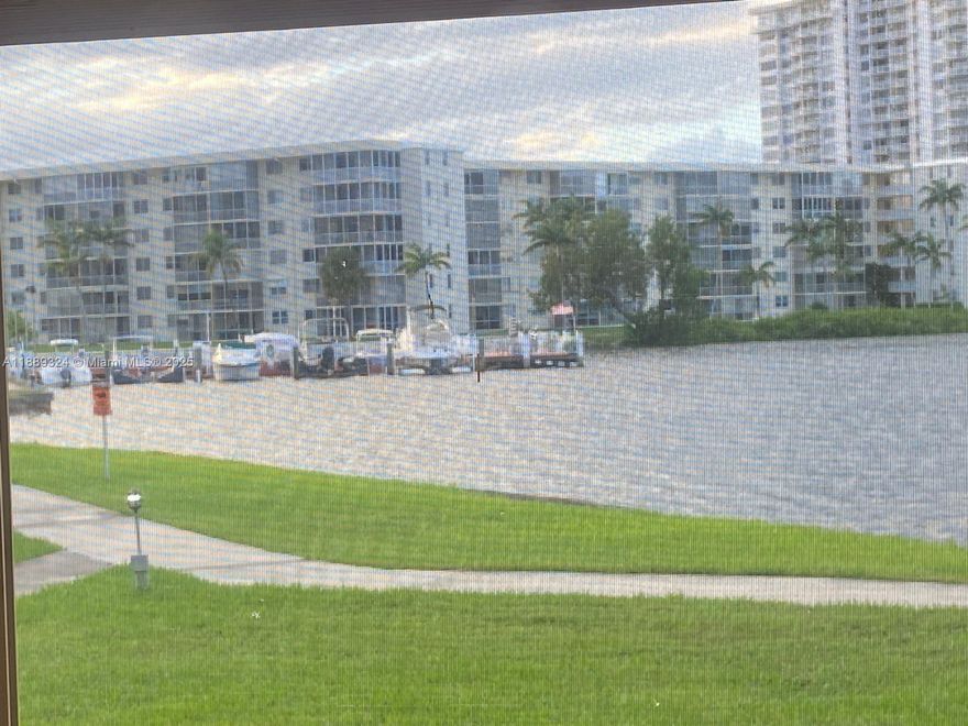 Enjoy stunning bay and marina views from this spacious 2BR/1BA condo in the sought-after Point East 55+ gated community in Aventura. This first-floor unit offers 960 sq. ft. of bright living space with easy access and plenty of natural light. Relax by the water on scenic walking paths or take advantage of resort-style amenities: multiple pools, gym, clubhouse, theater, billiards, library, and courtesy bus. Point East also offers 24-hr security and waterfront picnic areas. Perfectly located near Aventura Mall, Gulfstream Park, beaches, dining, and highways, this condo is ideal as a primary home or seasonal retreat. Experience comfort, convenience, and breathtaking views in one of Aventura’s most desirable communities!
