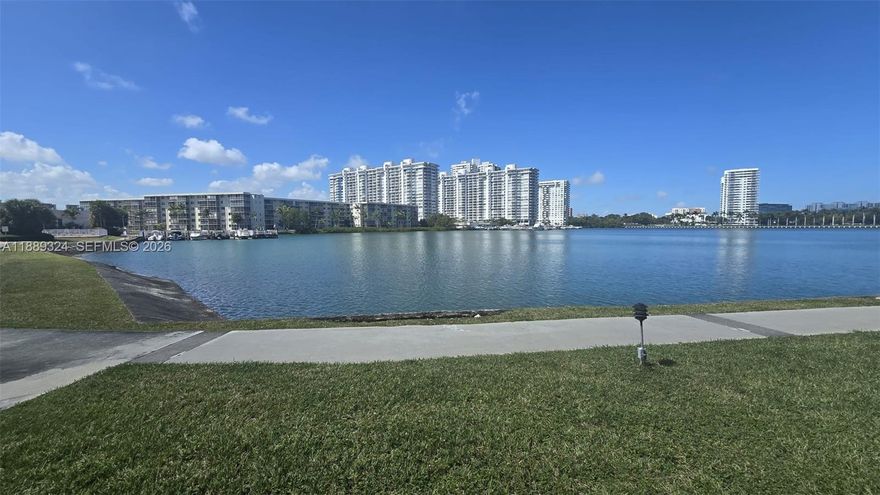 Enjoy stunning bay and marina views from this spacious 2BR/1BA condo in the sought-after Point East 55+ gated community in Aventura. This first-floor unit offers 960 sq. ft. of bright living space with easy access and plenty of natural light. Relax by the water on scenic walking paths or take advantage of resort-style amenities: multiple pools, gym, clubhouse, theater, billiards, library, and courtesy bus. Point East also offers 24-hr security and waterfront picnic areas. Perfectly located near Aventura Mall, Gulfstream Park, beaches, dining, and highways, this condo is ideal as a primary home or seasonal retreat. Experience comfort, convenience, and breathtaking views in one of Aventura’s most desirable communities!, all offers are WELCOME!