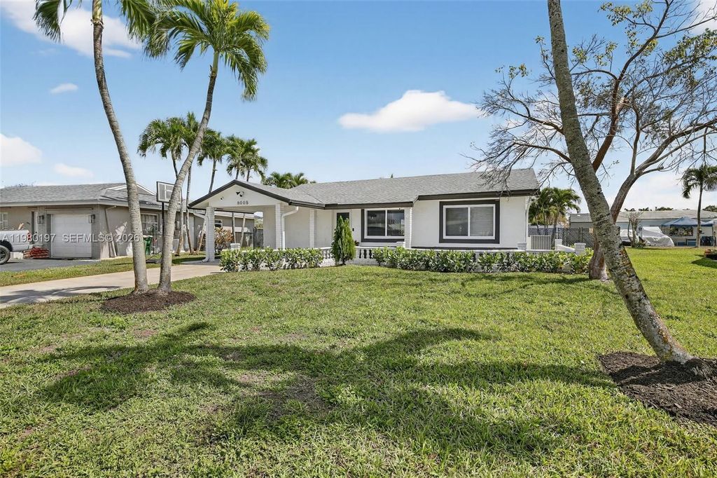 Photo of 8008 NW 101st Ave, Tamarac, FL 33321 (MLS # A11980197)