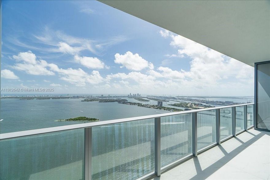 Experience luxury waterfront living in this brand-new residence at Aria Reserve. This never-lived-in 1 bedroom + den, 2 full bathroom home offers stunning panoramic views of Biscayne Bay, the city, and the ocean. Designed with modern elegance, it features glass shower doors, illuminated bathroom mirrors, and designer motorized curtains in the bedroom and living area. Aria Reserve redefines resort-style living with world-class amenities including a spa, tennis, paddleball, squash and basketball courts, a private dog park, and two spectacular pools — one overlooking the bay and another semi-Olympic.