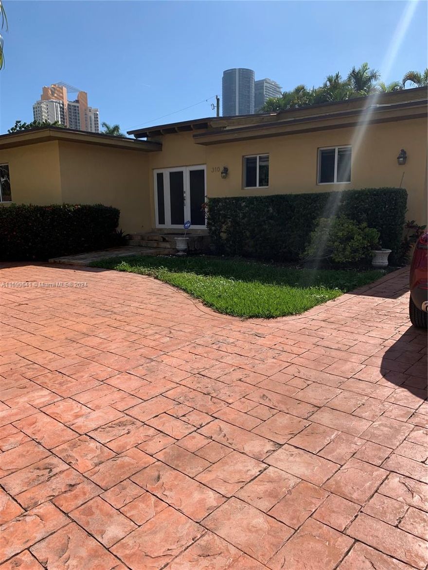 A TOTALLY REMODELED SINGLE HOUSE IN A GREAT NEIGHBORHOOD, SUNNY ISLES . AMAZING LOCATION !!!
4 bedrooms, 3 full bathrooms, a large Den with French doors to the backyard . A Jacuzzi  and a 200 SF Shed . A patio for entertainment. 2 Refrigerators inside the house and a third one in the shed . 2 bedrooms and a bathroom have a separate entrance . Use for family or rent out . Upgraded  Electrical panel , impact windows , skylights and doors . Porcelain and marble bathrooms . Driveway can accommodate up to 10 cars . Near A+ Schools . Walking distance to the beach , supermarkets and the house of gods .
