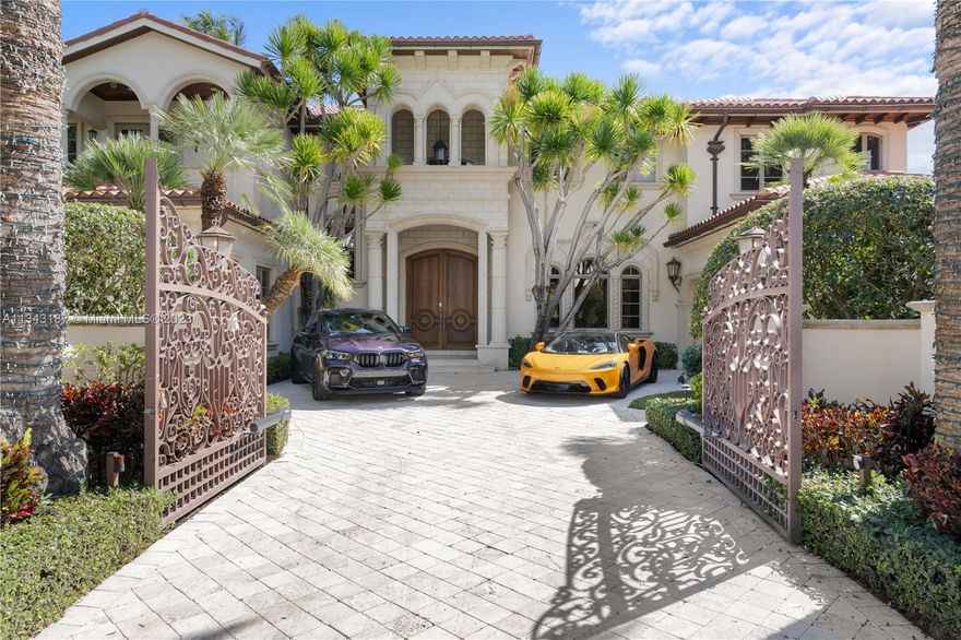 Located in most prestigious Isles in Las Olas, this private and secure estate boasts 100 feet on the water. The property is on the widest/deepest canal in the Isles. Custom built in 2002 with Exceptional finishes/craftsmanship throughout. Newer roof (2021). The Estate includes a formal Living Room with coffered, gold foil ceilings, Neff Cabinetry, Marble floors, custom baseboards/plaster crown molding. Beautiful bronze staircase, home theater, 2 laundry Rooms, 4 car garage, lighting system, outdoor gazebo with kitchen. Large custom pool with built in separate Jacuzzi, concrete dock, cabana bath, large covered patios. Royal Palm Dr offers underground utilities, natural gas and higher elevations. Property has security entry door gates and security cameras in and out.