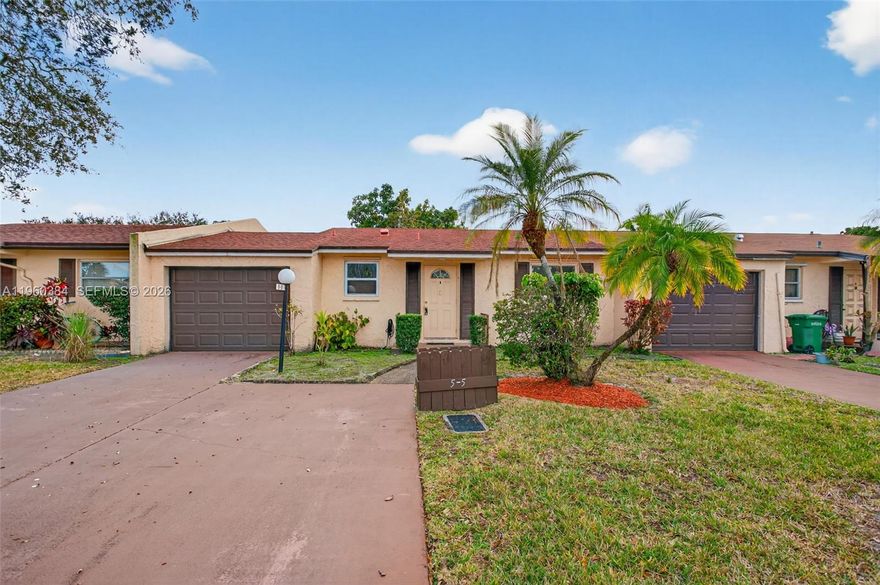 Welcome home to this spacious & beautifully maintained villa in the 55+ community of Garden Patio Villas the heart of Margate! This inviting residence offers a bright, open layout with tile flooring throughout, abundant natural light, & a seamless flow between living, dining, & kitchen spaces — perfect for comfortable everyday living & entertaining. The updated kitchen features rich wood cabinetry, granite countertops, stainless steel appliances, & a stylish mosaic tile backsplash, creating a warm & functional space for cooking & gathering. Enjoy generously sized bedrooms, with ensuite bathrooms & one tastefully updated with modern vanities, tilework & finishes. Step outside to your private outdoor patio & enjoy tranquil green space views - ideal for morning coffee, relaxing evenings, or simply taking in the Florida sun & beautiful weather. Additional highlights include an in-unit laundry area, ample storage, & an attached 1 car garage with room to park two cars in the driveway for the ultimate convenience. 2020 Roof, 2019 WH, 2022 AC for peace of mind! Located in a well-kept community close to shopping, dining, parks, & major roadways, this home offers the perfect blend of comfort, accessibility, & value. PET FRIENDLY 2 dogs/cats allowed per villa! Low HOA covers water, heated pool, grass, hedges & association trees, common areas. 10% downpayment required by HOA. NO RENTING. Don’t miss this opportunity to own a move-in ready villa in a prime Margate location!