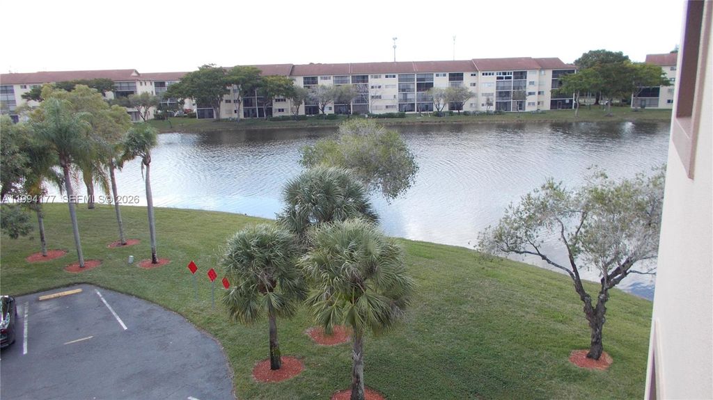 Photo of 13705 SW 12th St #401B, Pembroke Pines, FL 33027 (MLS # A11994177)