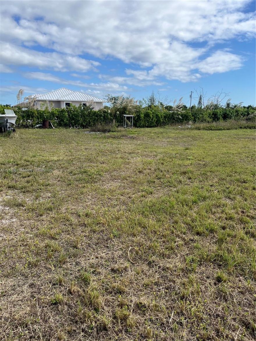 Great opportunity to purchase a vacant land in a well planned community to build your own home.  Inside Urban Development Area, very quiet and beautiful area, corner lot already clean, fenced, and a 30 foot deep well.  Please contact Miami Dade County for all building and zoning questions.