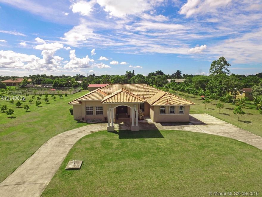 BEAUTIFUL RESIDENCE IN REDLAND INCLUDES 5BEDS/4BATHS,POOL(15x34ft) EXCELLENT FAMILY HOME. BUILT IN 2007.THIS PROPERTY IS METICULOUSLY MAINTAINED. FEATURES INCLUDE:VAULTED 9"CEILING,RECESSED LIGHTING & TILE FLOORS THROUGHOUT.IT HAS AN OPEN FLOOR PLAN & GOURMET KITCHEN W/GRANITE.LARGE MASTER SUITE HAS A SITTING AREA W/LARGE TUB & SHOWER.SITUATED ON 1.25 ACRES & 3,766 SQ/FT ADJUSTED AREA.FENCED LOT,2-CAR GARAGE.PRICE ALSO INCLUDES ADJACENT 1.25 ACRES LOT W/166 GROWING FRUIT TREES. (2 FOLIOS ON THIS PROPERTY)