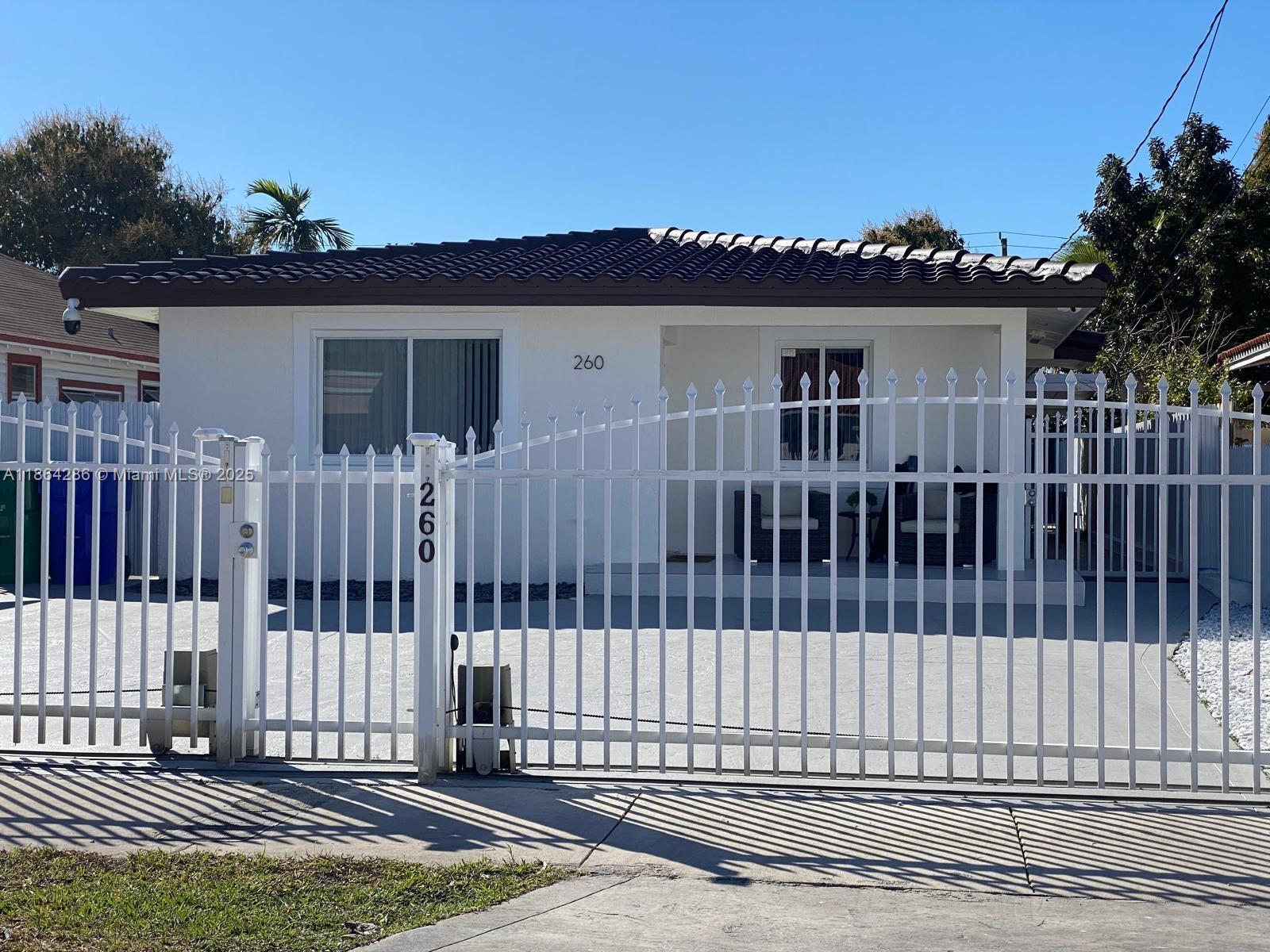 Completely renovated 1-story single-family home with 3 bedrooms, 2 bathrooms, and private pool in one of Miami’s most desirable areas. This modern residence features impact windows, electric gates, and a new electrical system with smart LED lighting throughout the home. Gorgeous remodeled kitchen with granite countertops, upgraded bathrooms with Jacuzzi, elegant white porcelain floors, and spacious closets. Enjoy outdoor living with a beautiful patio, pool, and built-in bar—perfect for entertaining. Additional highlights include security cameras and a remodeled laundry area. Move-in ready, combining comfort, style, and prime location!