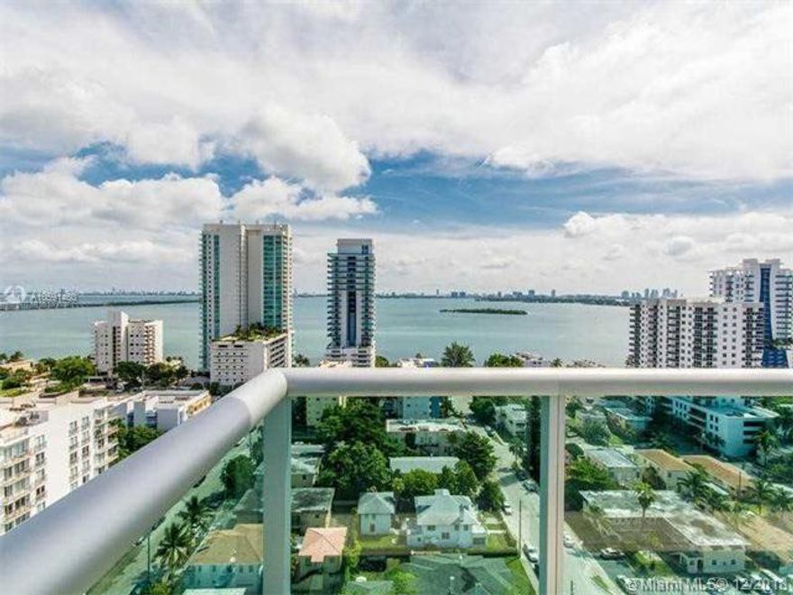 SPECTACULAR VIEWS OF BISCAYNE BAY, INTRACOASTAL, MIAMI BEACH AND SKYLINE. CONTEMPORARY LUXURY BUILDING IN THE HEART OF THE DESIGN DISTRICT. 2 BEDROOM, 2 BATH UNIT WITH WRAP AROUND BALCONY,BEST LINE IN THE BUILDING, MARBLE AND WOOD FLOORS THROUGHOUT, FLO OR TO CEILING IMPACT WINDOWS. EUROPEAN KITCHEN WITH STAINLESS STEEL APPLIANCES. 5-STAR AMENITIES: 75FT INFINITY POOL, SAUNA, FITNESS CENTER, LOUNGE, COVERED BAR. MINUTES FROM DOWNTOWN, BRICKELL, MIAMI BEACH, CAFES, SHOPS & PARKS.UNIT COMES WITH STORAGE