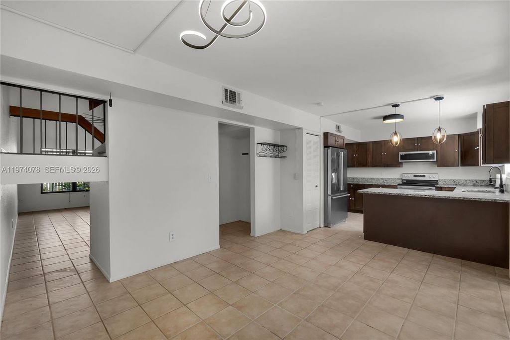 Photo of 1550 SE Dewberry Ct, Port St Lucie, FL 34952 (MLS # A11974078)