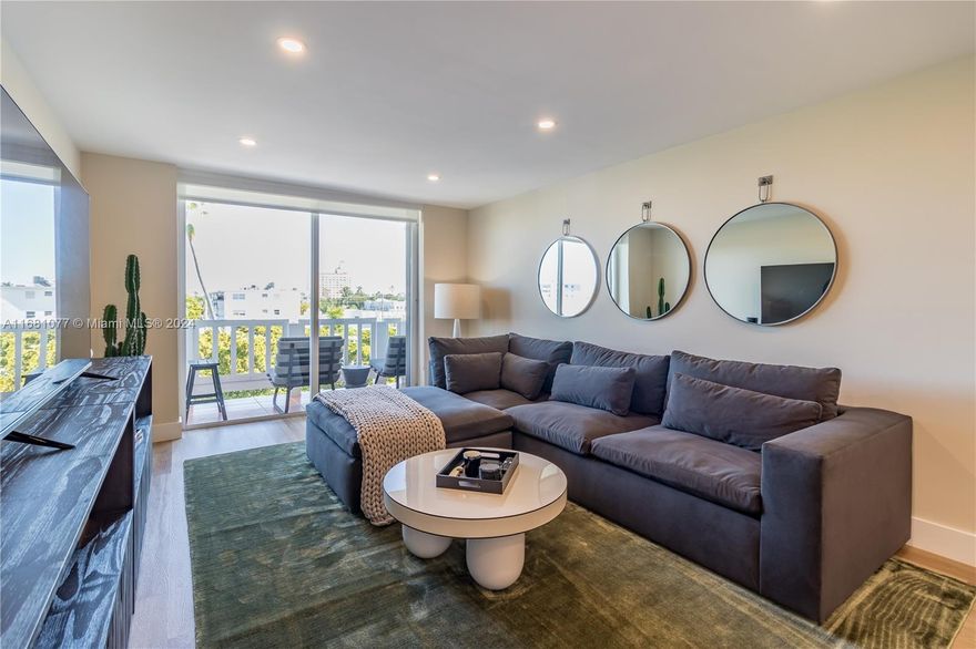 Exquisite, completely renovated one-bedroom, one-bathroom residence on the top floor, ready to move in! This turnkey corner unit, professionally designed and fully furnished, features two exposures with large windows, filling the space with abundant natural light. Residence additionally features generously sized bedroom, updated bathroom, expansive living/dining area, and modern kitchen with granite countertops and new top-of-the-line stainless appliances. Additionally, the residence includes a spacious open balcony offering tree lined views of South Beach and comes with a designated covered parking space. Nestled within a gated complex at the heart of South Beach, it is just steps away from the ocean, shopping, Flamingo Park and more.