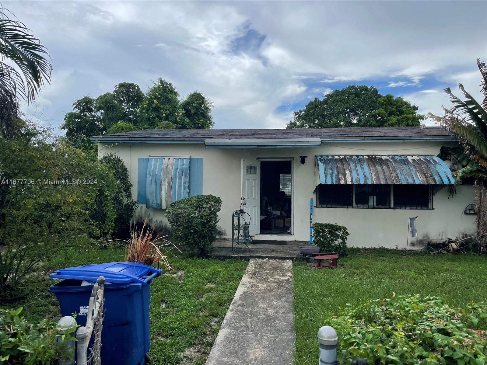 Opa-locka fixer-upper! 4 bed/2 bath, classic layout, large lot. Needs TLC but offers great potential for customization. Prime location, close to amenities and Miami attractions. Invest in your dream home today!