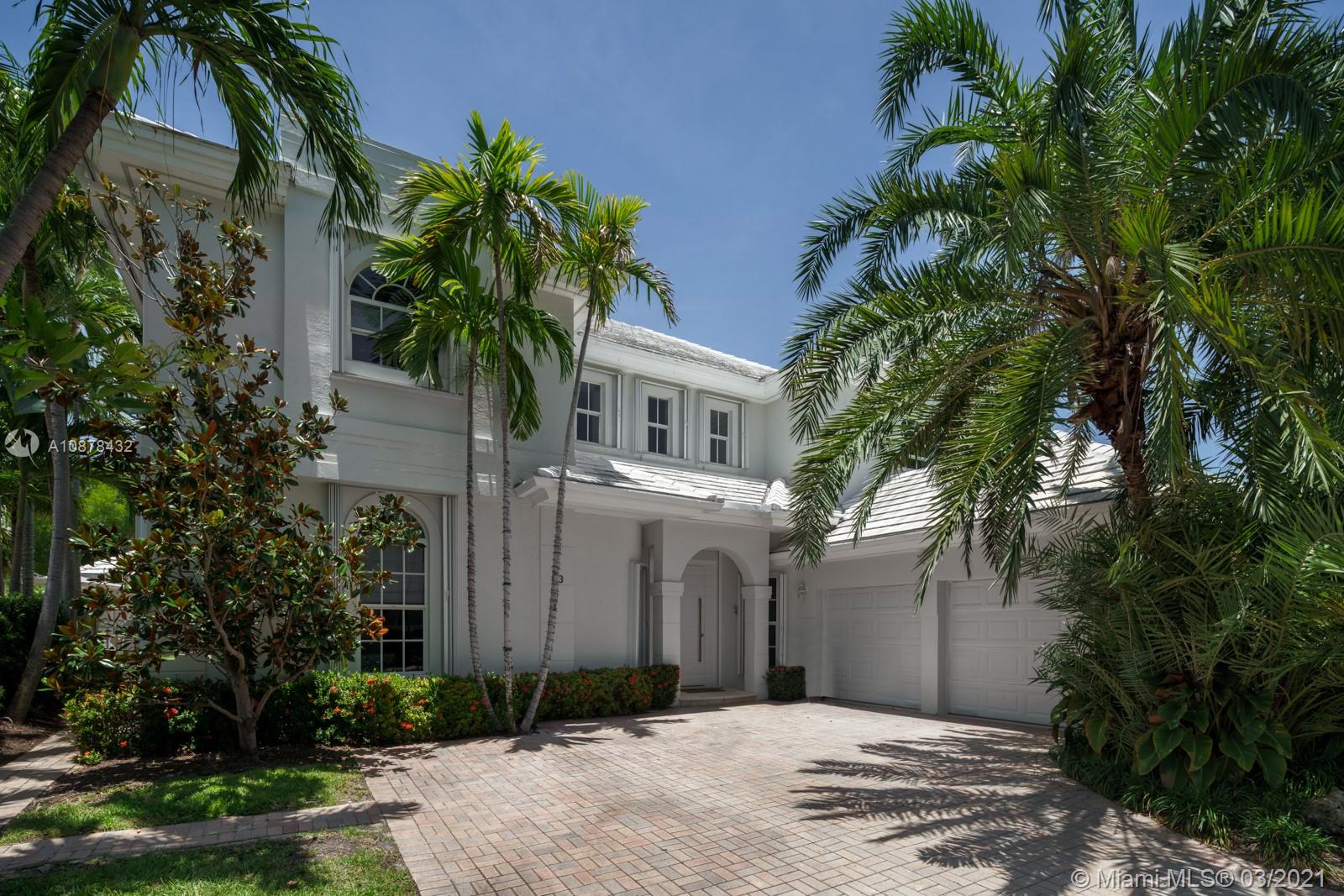 The original model home of Grand Bay Estates offers the best location, largest SF and lot size, almost double, of any home in this secure and gated Key Biscayne community. A single family home, minus the hassles of maintenance, that offers beach access and membership to amenities of Ritz Carlton/Grand Bay Club. This home is in immaculate, move in ready condition. Large MB with custom WIC and upgraded bathroom. Perfect upstairs den/office for working from home. Current owners have added features such as: glass wine cellar dividing DR and newly renovated kitchen; wood & marble floors, glass railings, security and alarm system, surround sound, converted garage to 2nd family room, & more. Gorgeous back yard with built in BBQ, covered patio, deck & pool area is perfect for entertaining.