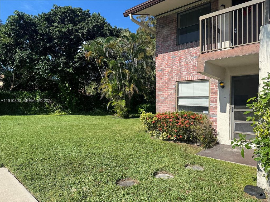 Photo of 6031 Shakerwood Cir #101, Tamarac, FL 33319 (MLS # A11910802)