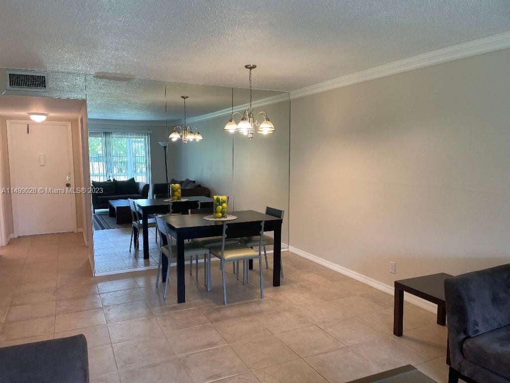 Photo of 950 Hillcrest Dr #102, Hollywood, FL 33021 (MLS # A11499028)