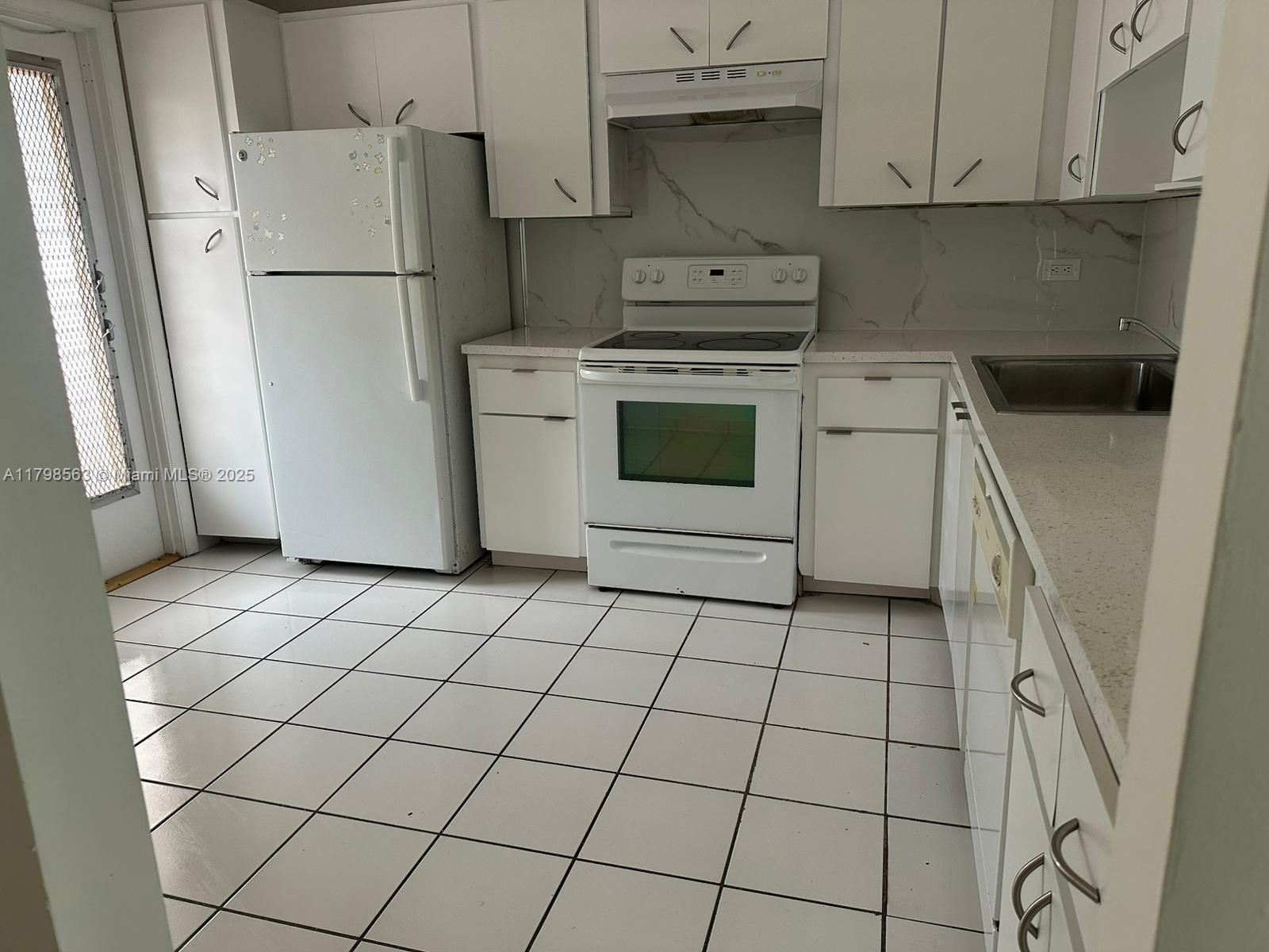 447 NE 195 TH ST 220