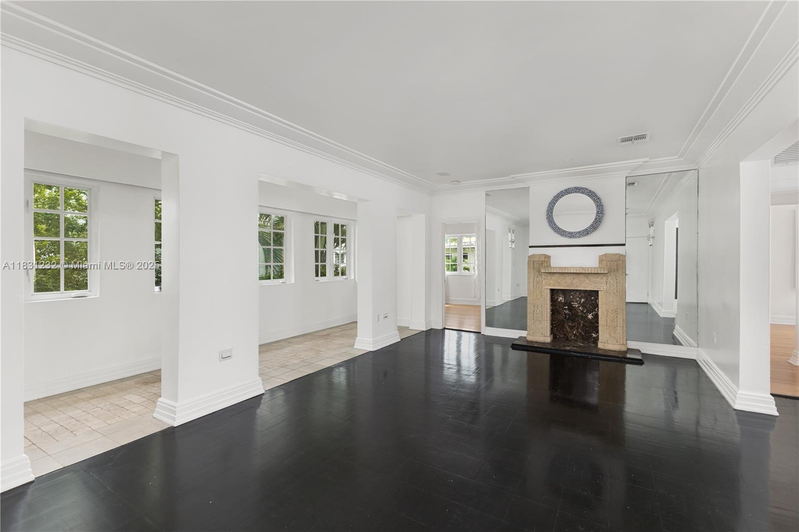 Beautifully restored Art Deco building walking distance to the beach and to South Beach’s world-class shopping & dining. Light-filled living spaces with volume ceilings, original architectural details (including plaster crown moldings, ziggurat arches & stone fireplace) and black parquet-wood flooring. Formal living, dining + den/office space. Kitchen features classic white wood cabinetry, Bosch refrigerator & dishwasher, and gas range. 2 spacious bedrooms with ample closet space + 2 updated baths. Full sized, in unit washer & dryer, Impact windows throughout. Located across the street from Flamingo Park which offers an aquatic center, dog park, children’s playground, handball/racquetball courts, running track & tennis center. Intimate 4 unit condo has a new roof & lovely common backyard.