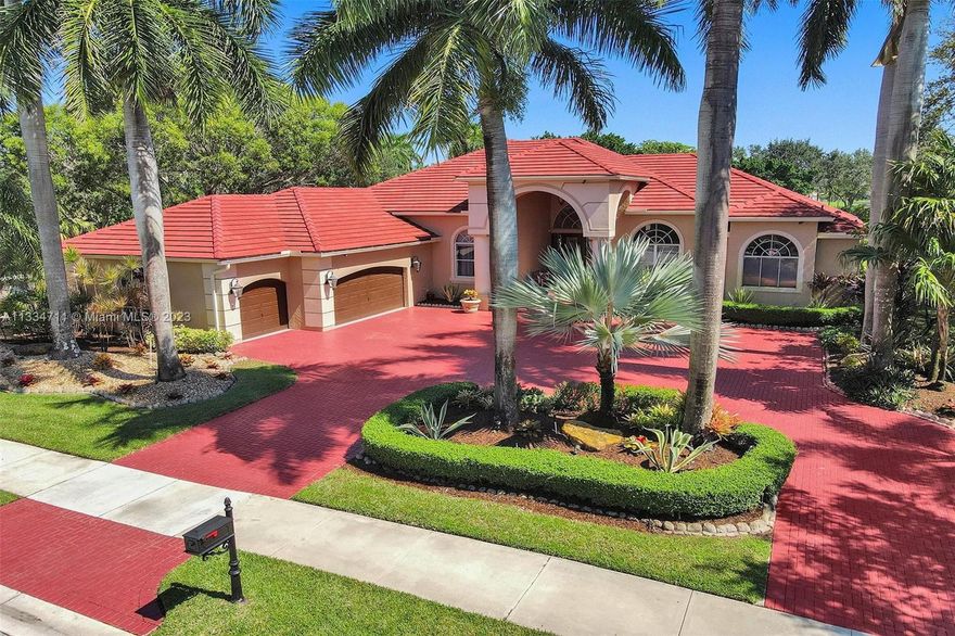 Presenting a year-round retreat nestled in the private & intimate enclave of The Landings. This fabulous lakefront estate sits on an oversize lot, offering an expansive floor-plan with soaring ceilings & abundance of light. Featuring 2 generously sized main suites, 6 bedrooms with ensuite baths + guest/cabana bath, office, formal dining, living room, breakfast nook & ample family room. The chef's kitchen showcases quartz counters, plenty of storage & work space. A laundry room & three-car garage complete the home. The inviting outdoor space feels like a resort unto itself with a sparkling pool, perfect for entertaining, relaxation & amazing sunsets. Enjoy gated access, sports court, children's play areas, close proximity to shopping, dining & access to highly rated schools. Vast potential!