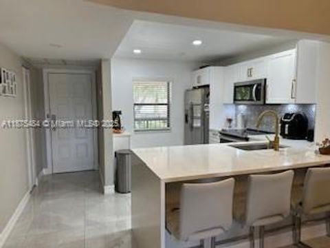 Photo of 8360 E Boca Glades Blvd E #8360, Boca Raton, FL 33434 (MLS # A11875484)