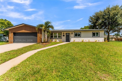 Photo of 3940 NW 5th St, Coconut Creek, FL 33066 (MLS # A12077028)