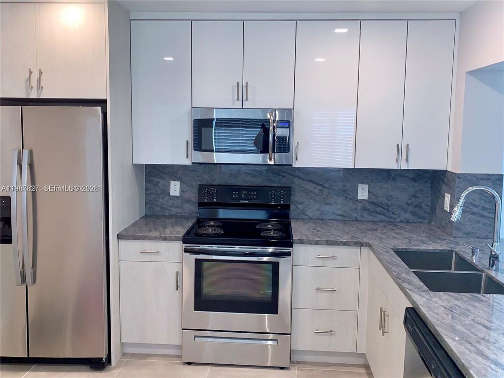 Photo of 2634 Fletcher Ct, Hollywood, FL 33020 (MLS # A11967827)