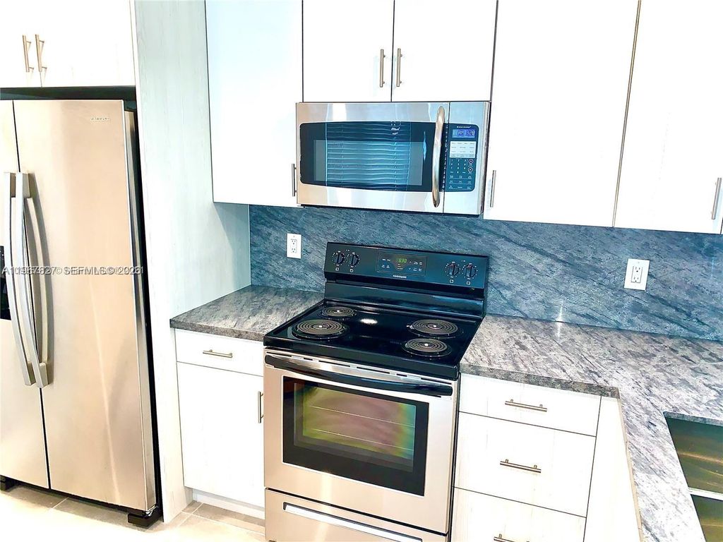 Photo of 2634 Fletcher Ct, Hollywood, FL 33020 (MLS # A11967827)