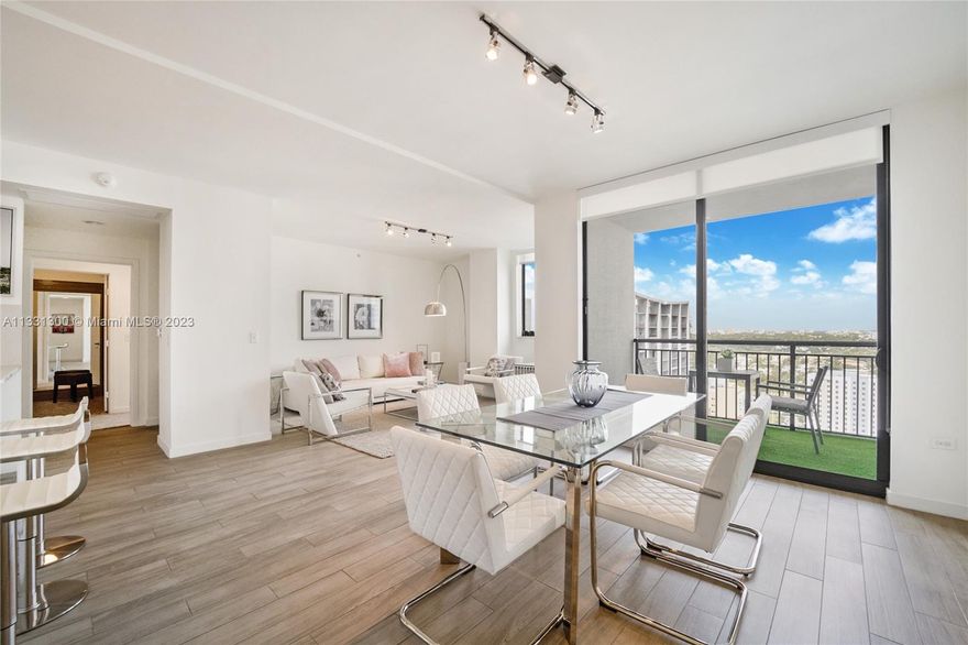 Spectacular views from this spacious 2 bed/2 bath on high-floor. Nine is above the Mary Brickell Village and just steps from Brickell City Center, Metro Mover, Metro Rail, and over 35 restaurants. This apartment features imported porcelain tile in a wood grain finish, solar window shades and blackouts, Italian cabinetry, quartz countertops, stainless steel appliances, a washer & dryer, and large walk-in closets. Fully furnished BY TUI Style, just professionally painted and with brand new carpet in the bedrooms. The building's amenities include cabanas, a pool, a gym, lounges, a pavilion with grills, a yoga studio, and a children's play area. The apartment is fully furnished & decorated; one assigned car garage.
